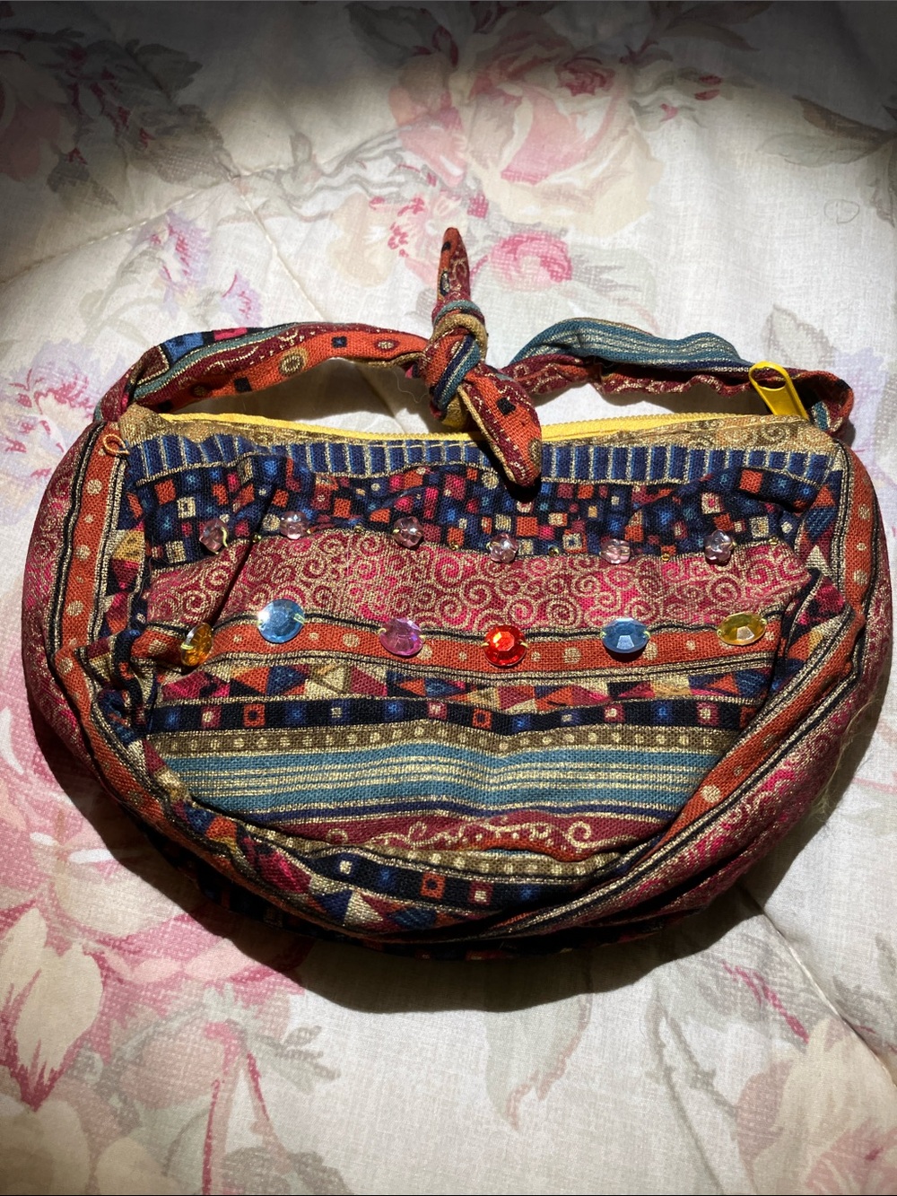 Essentials  clutch in pretty gold embellished fabric